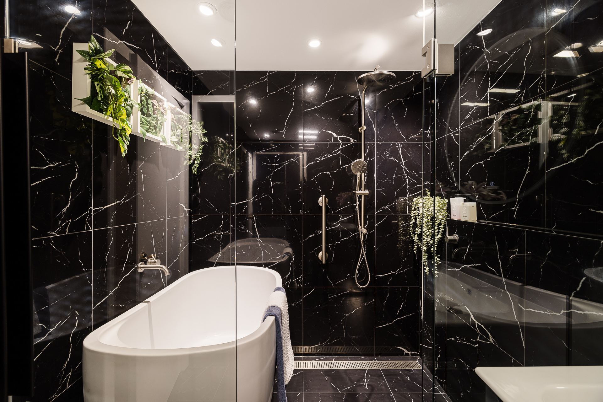 The Luxe Retreat — warm tile and stone materiality detail